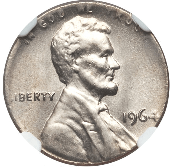 1964 Lincoln penny struck on silver dime planchet showing smaller silver-colored disc with penny design compared to normal copper penny