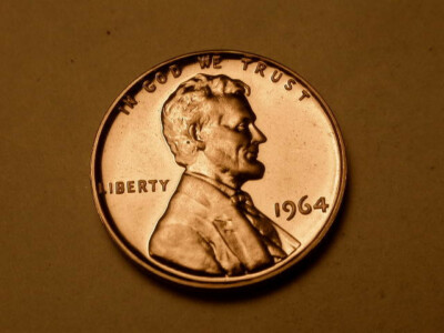 1964 Lincoln penny doubled die obverse close-up showing doubling on LIBERTY and IN GOD WE TRUST inscriptions with rounded secondary images